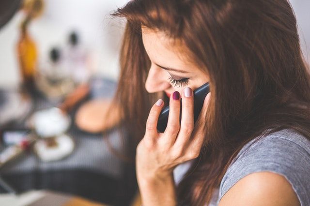person woman hand smartphone compressor
